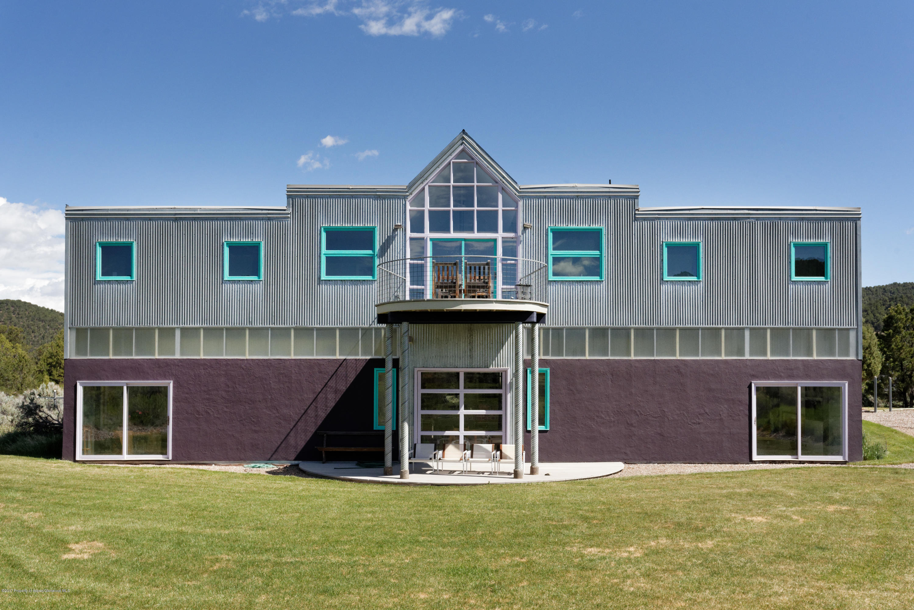 525 Cactus Flats Road Carbondale, CO 81623 - Photo 3 of 49 a front view of a house with a yard