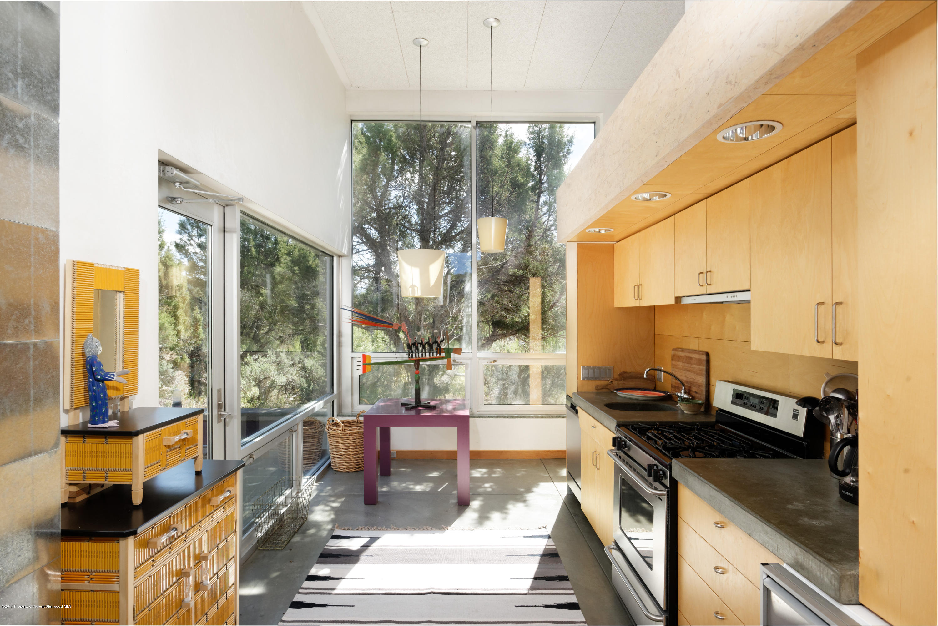 525 Cactus Flats Road Carbondale, CO 81623 - Photo 36 of 49 a kitchen with a large window and a counter top space
