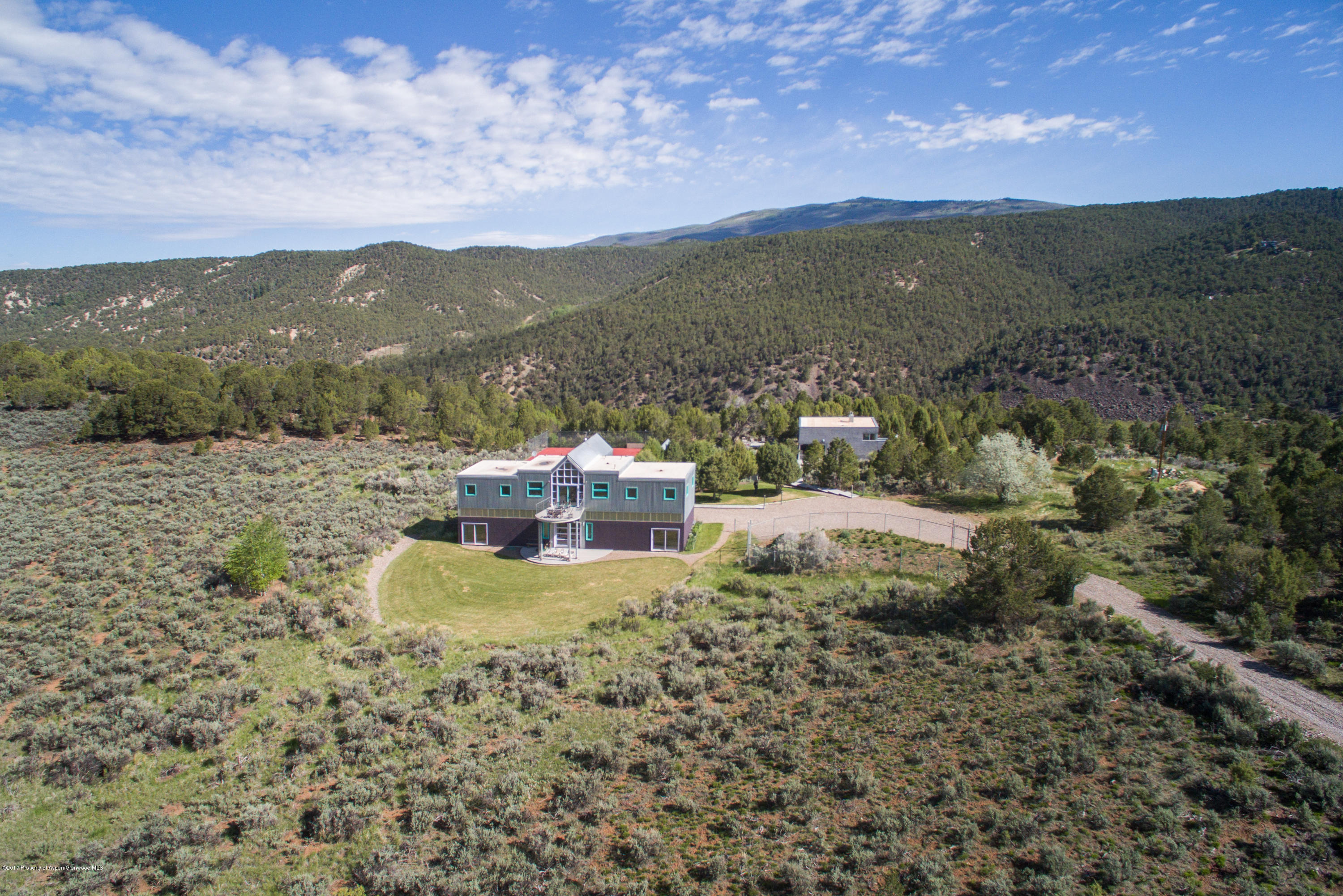 525 Cactus Flats Road Carbondale, CO 81623 - Photo 45 of 49 a view of a lake with a mountain