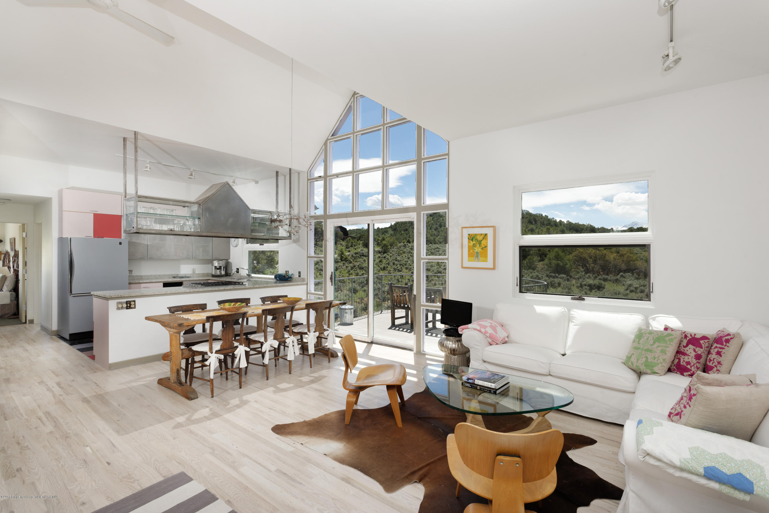 525 Cactus Flats Road Carbondale, CO 81623 - Photo 6 of 49 a living room with furniture and a large window