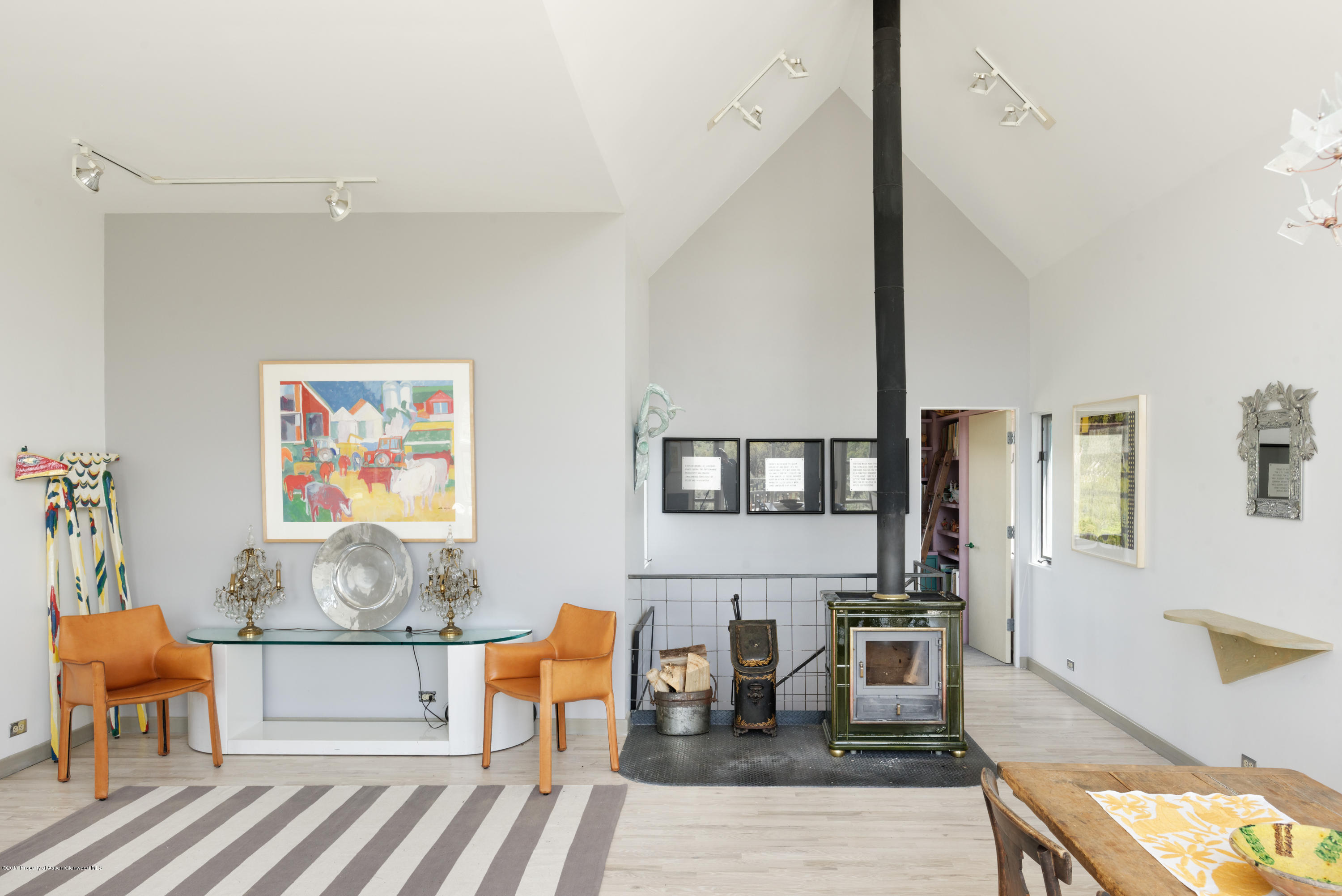 525 Cactus Flats Road Carbondale, CO 81623 - Photo 7 of 49 a living room with furniture and a table