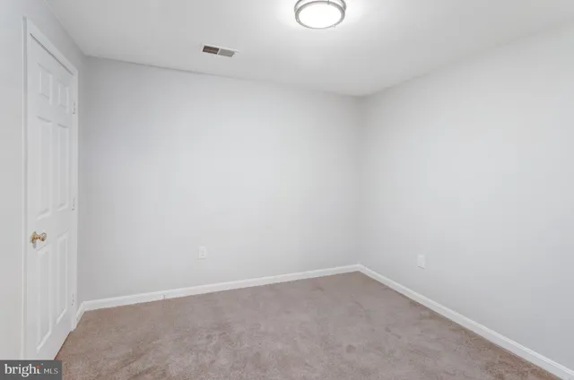 a view of a house with a roof deck