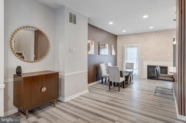 a view of a livingroom with furniture and a fireplace