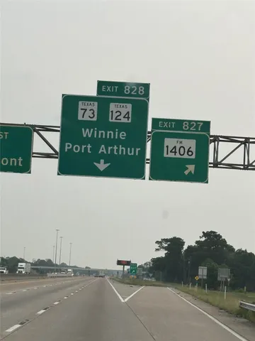 a view of a lake with a yard