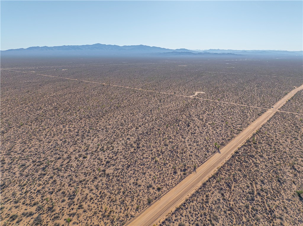 242-12-015 South Sundance Kid Road Yucca, AZ 86438 - Photo 14 of 21 a view of terrace with mountain view