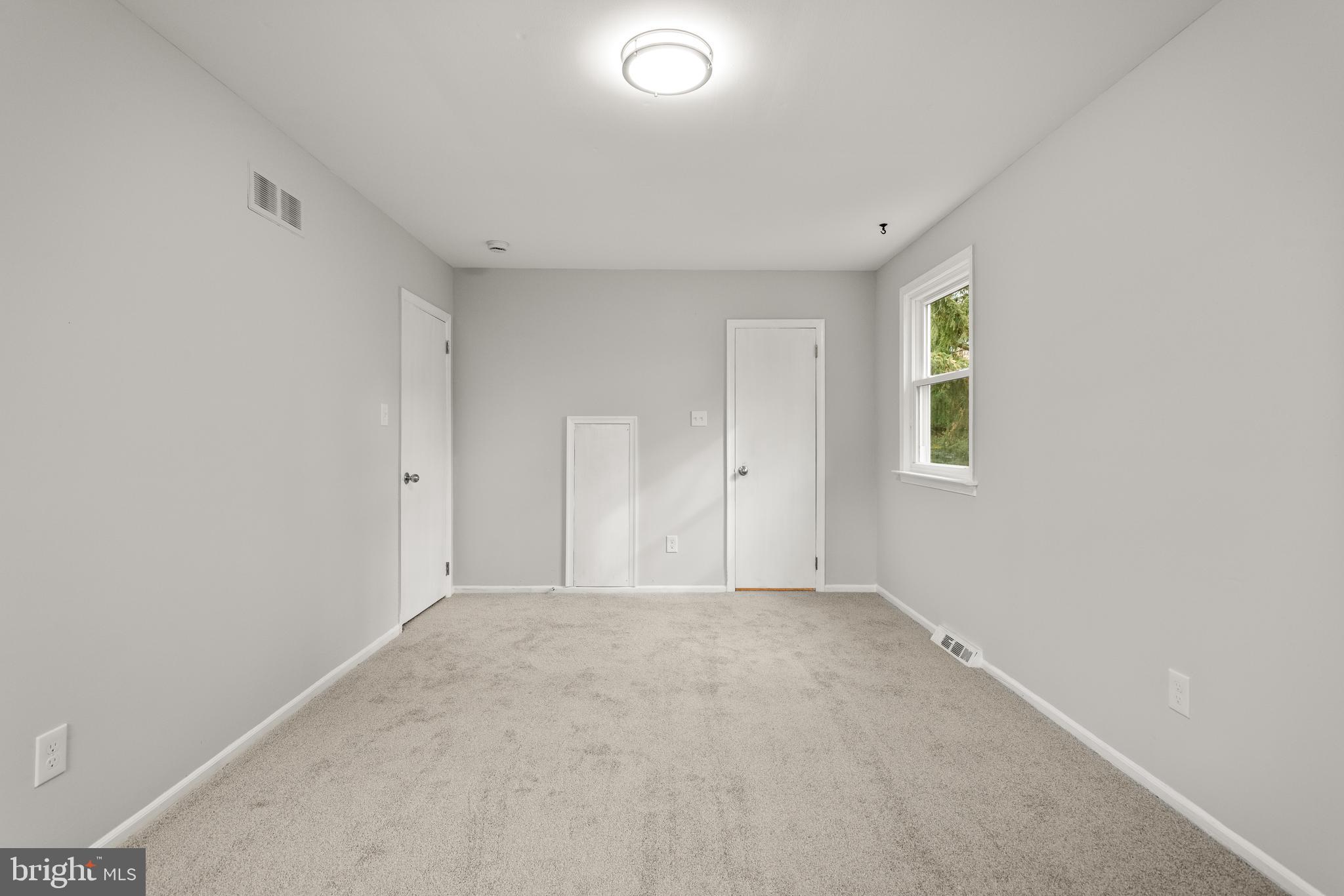 19 Windemere Court Downingtown, PA 19335 - Photo 14 of 24 a view of an empty room with a window
