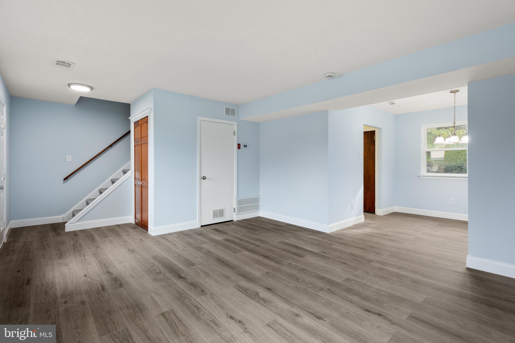 19 Windemere Court Downingtown, PA 19335 - Photo 4 of 24 a view of empty room with wooden floor and fan