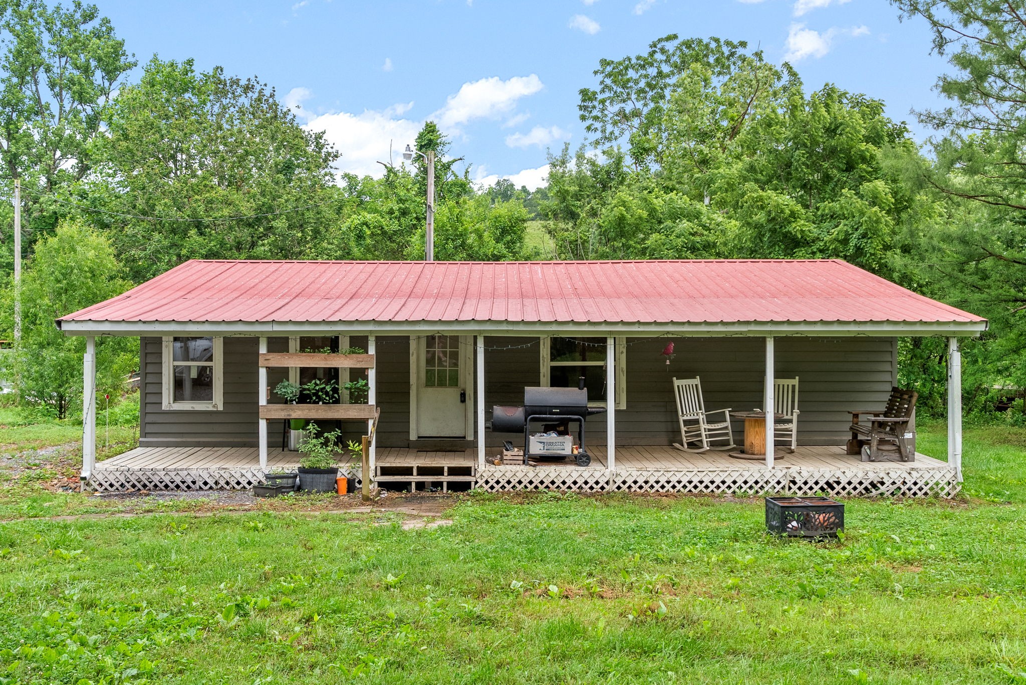 110 Little Fork Road Cumberland City, TN 37050 - Photo 2 of 32 a view of an house with backyard porch and sitting area