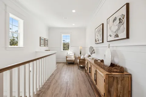 a view of a hallway with windows