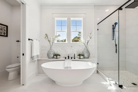 a bathroom with a bathtub and sink