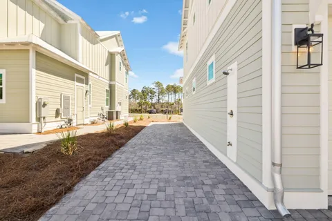 a view of a patio with a yard