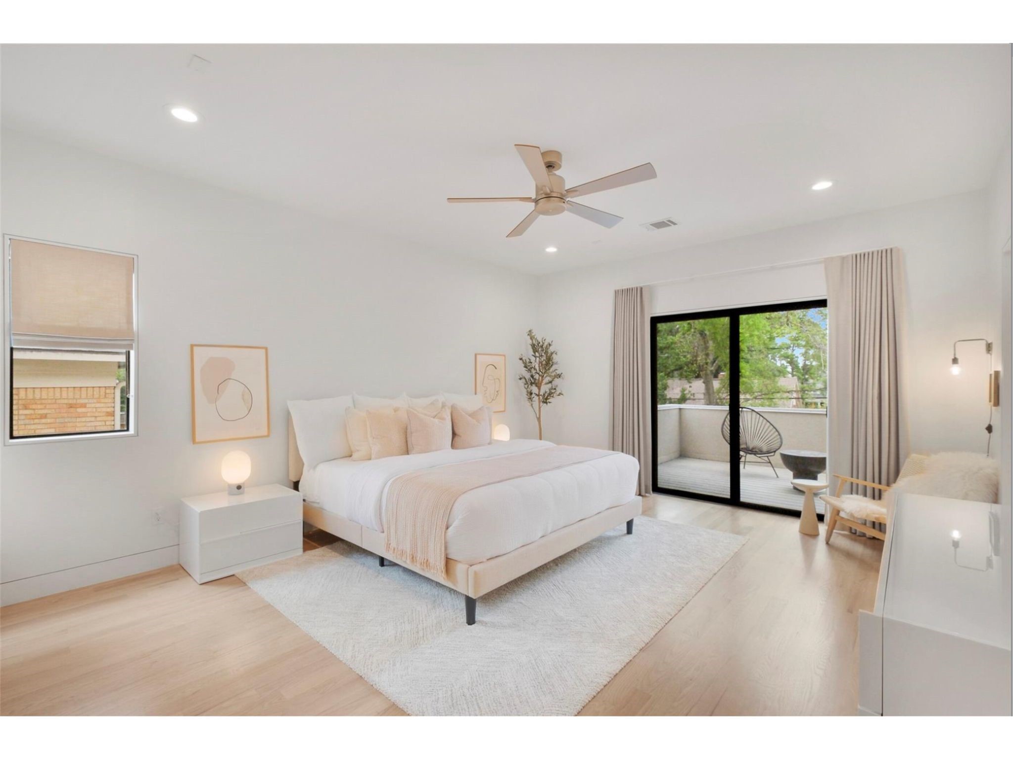 1912 Kipling Street Houston, TX 77098 - Photo 19 of 30 a living room with a bed furniture and a large window