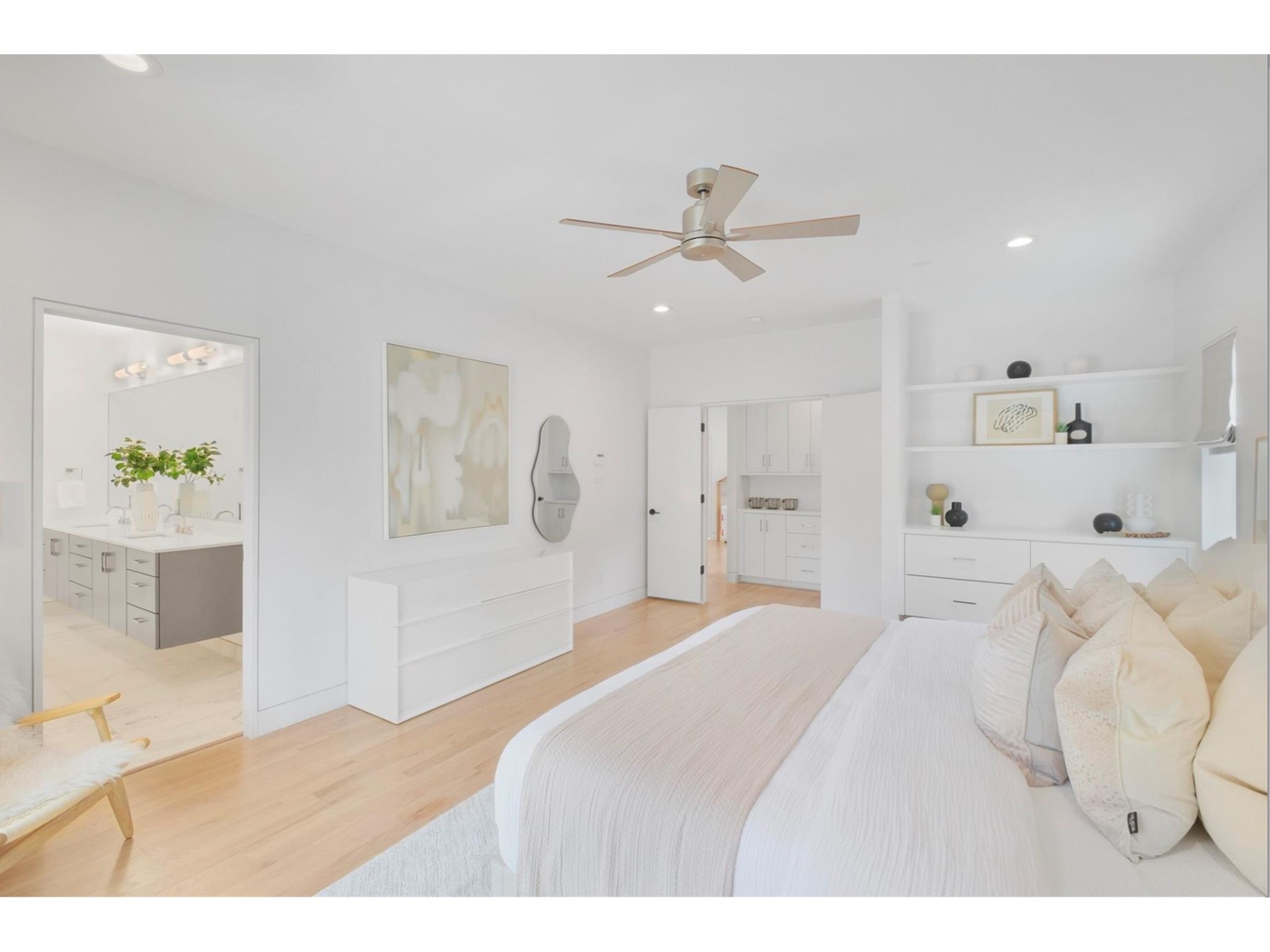 1912 Kipling Street Houston, TX 77098 - Photo 20 of 30 a bedroom with a bed and a chandelier