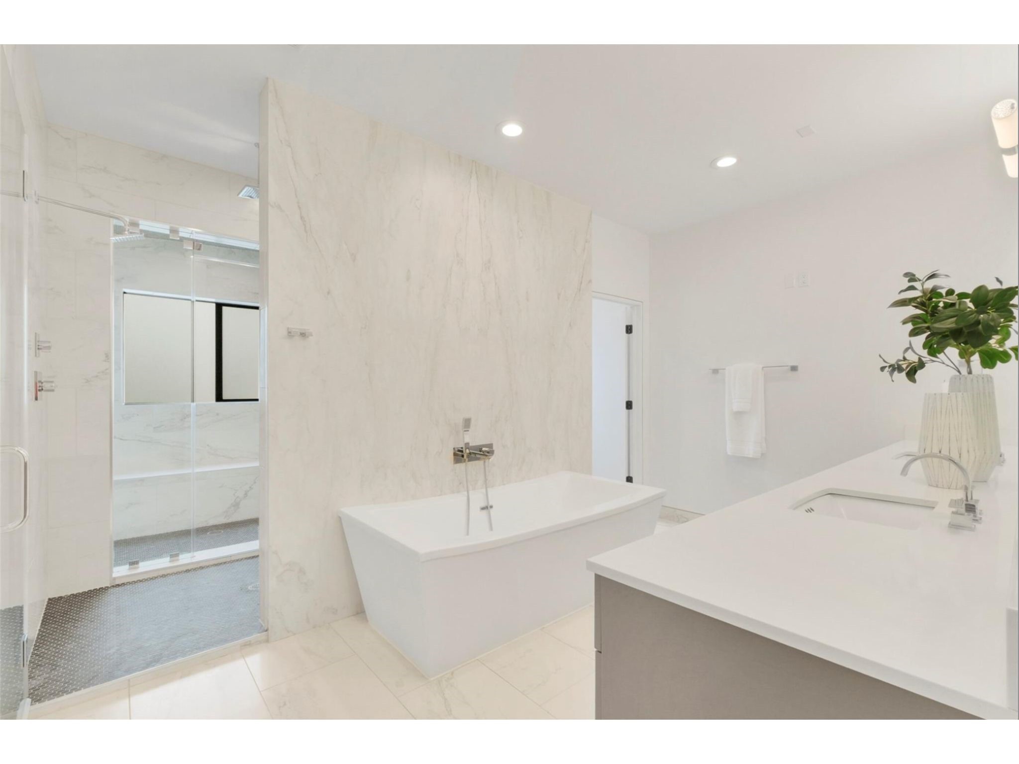 1912 Kipling Street Houston, TX 77098 - Photo 22 of 30 a bathroom with a sink a toilet and shower