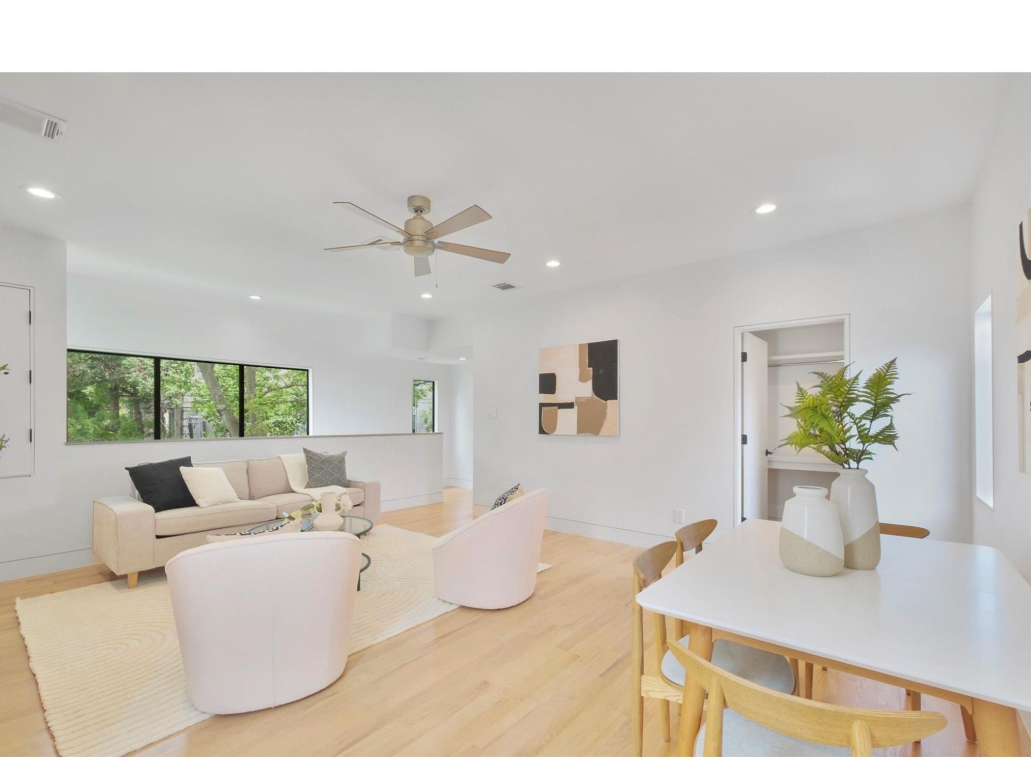 1912 Kipling Street Houston, TX 77098 - Photo 29 of 30 a living room with furniture and a potted plant