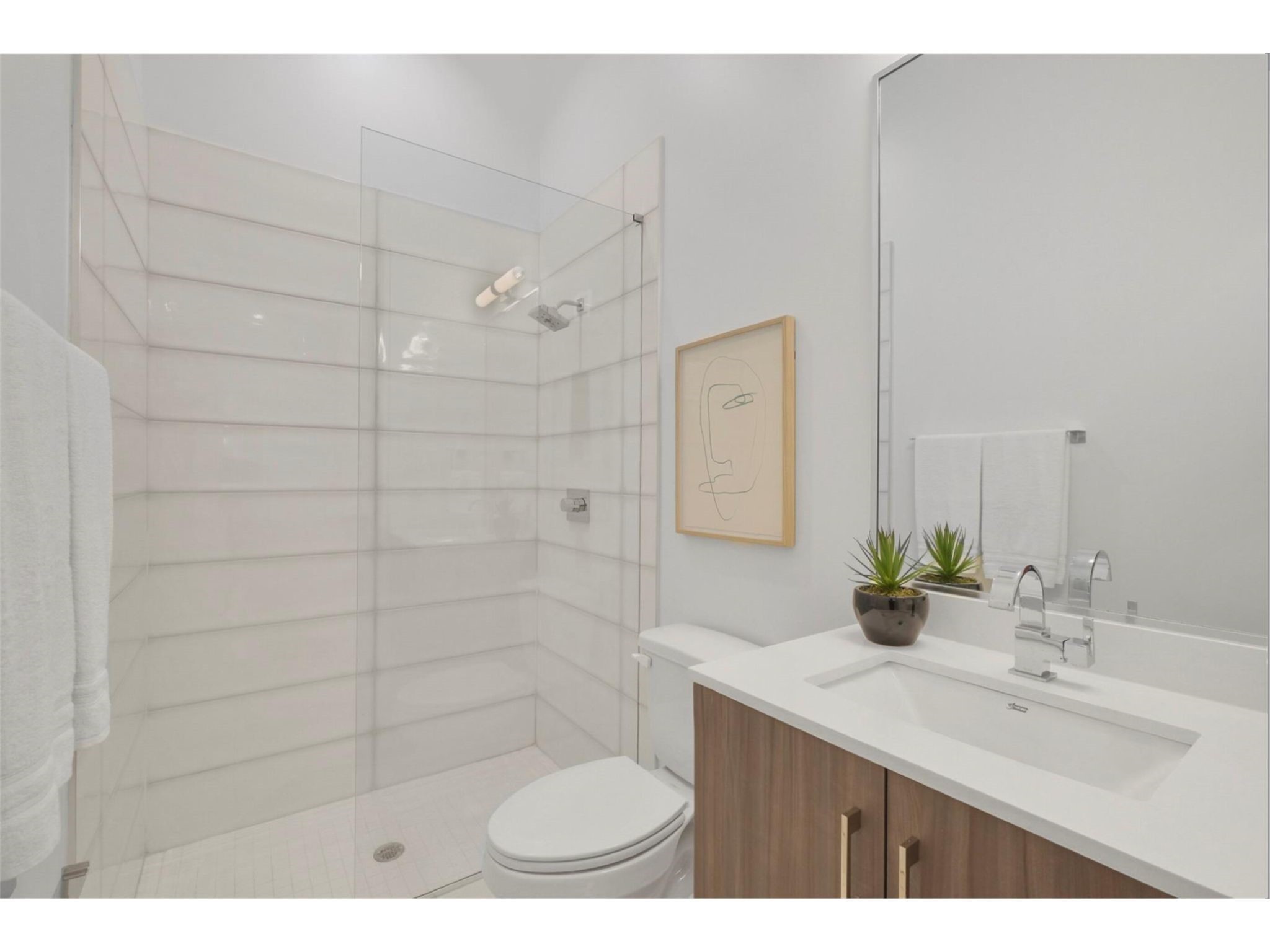 1912 Kipling Street Houston, TX 77098 - Photo 5 of 30 a bathroom with a sink shower and a mirror