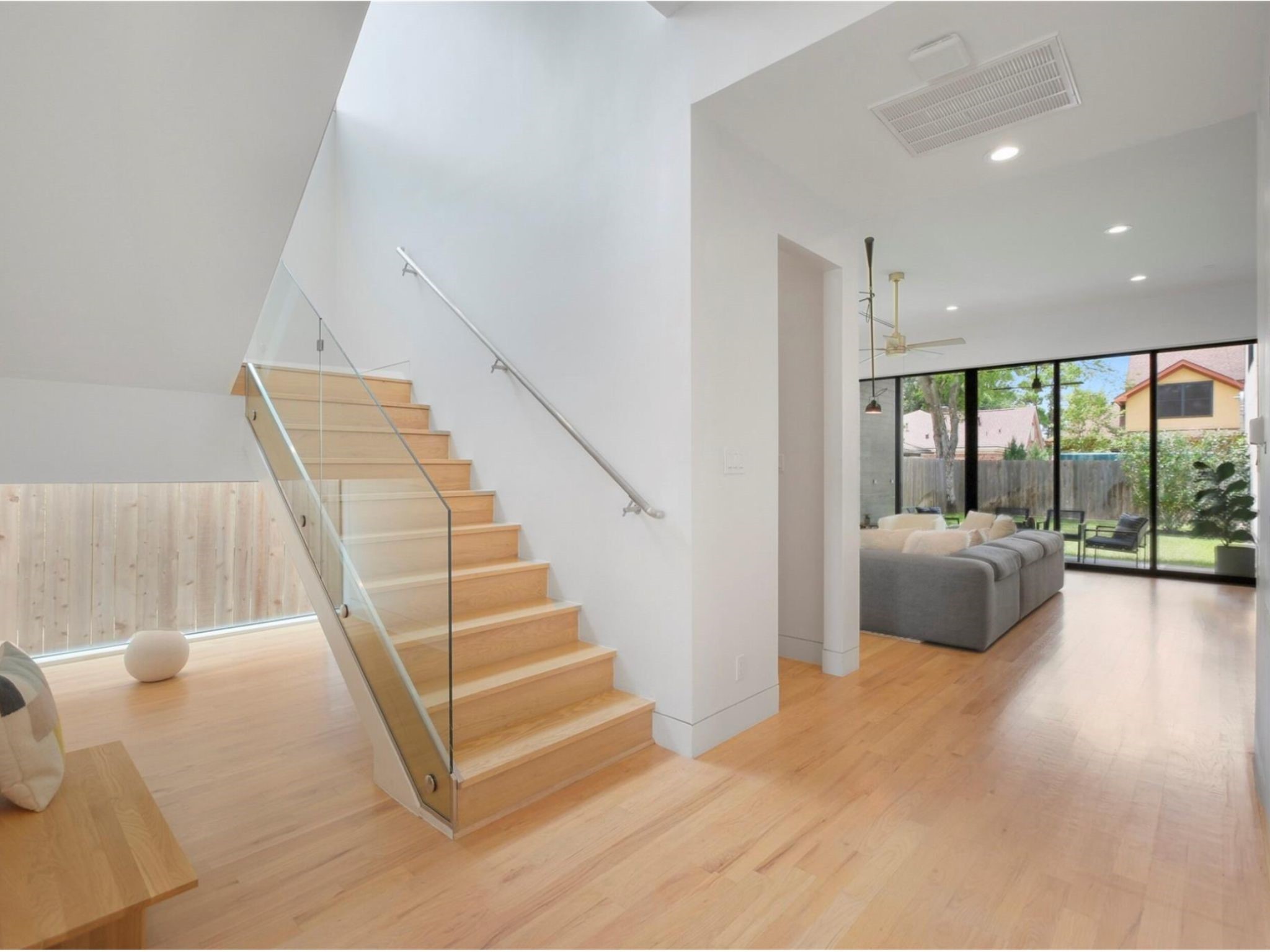 1912 Kipling Street Houston, TX 77098 - Photo 6 of 30 a view of entryway and hall with wooden floor