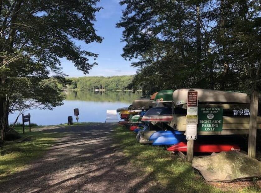 218 State Pk Road Gouldsboro, PA 18424 - Photo 13 of 22 a view of swimming pool with outdoor seating and trees