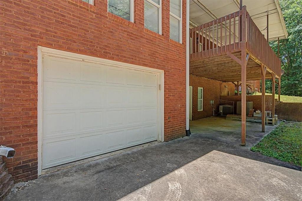 1136 Cole Lake Road Dallas, GA 30157 - Photo 64 of 72 a view of a house with a backyard