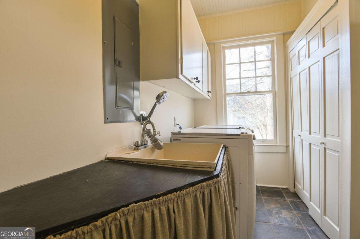 120 Tusten Street Elberton, GA 30635 - Photo 18 of 49 a bathroom with a sink and a mirror