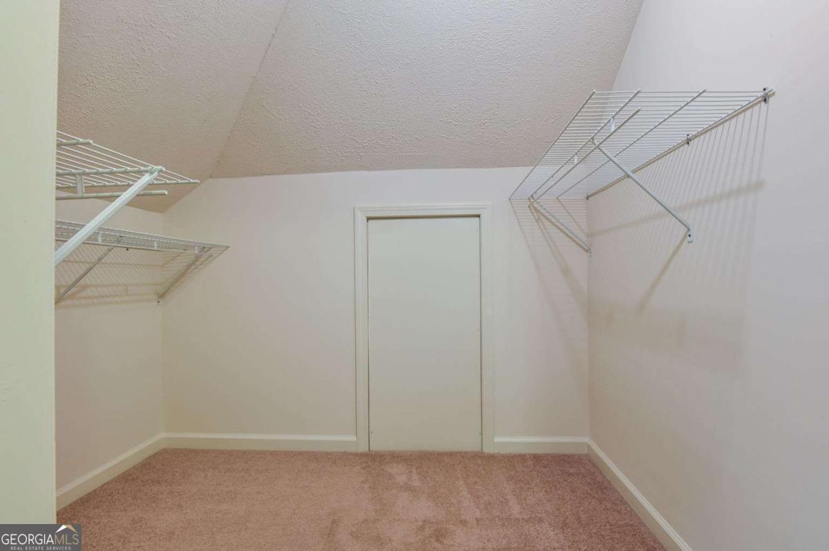 120 Tusten Street Elberton, GA 30635 - Photo 33 of 49 a view of an empty walk in closet
