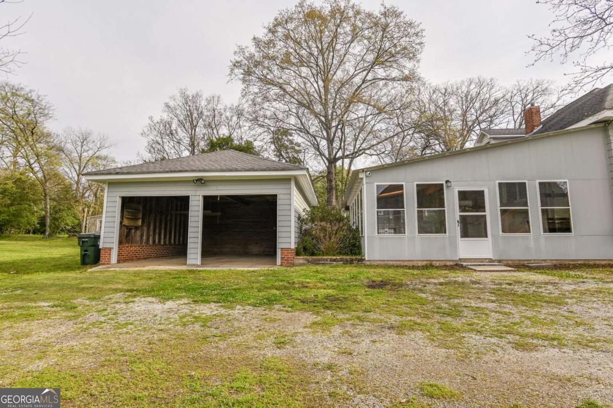 120 Tusten Street Elberton, GA 30635 - Photo 45 of 49 a view of a house with a yard