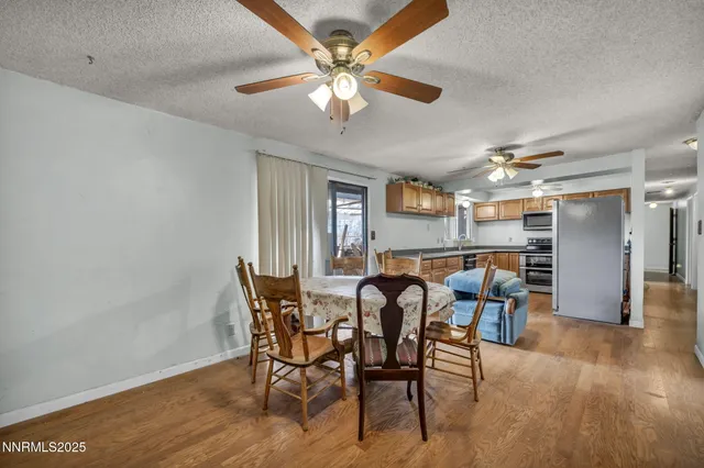 a bathroom with a shower a toilet and sink