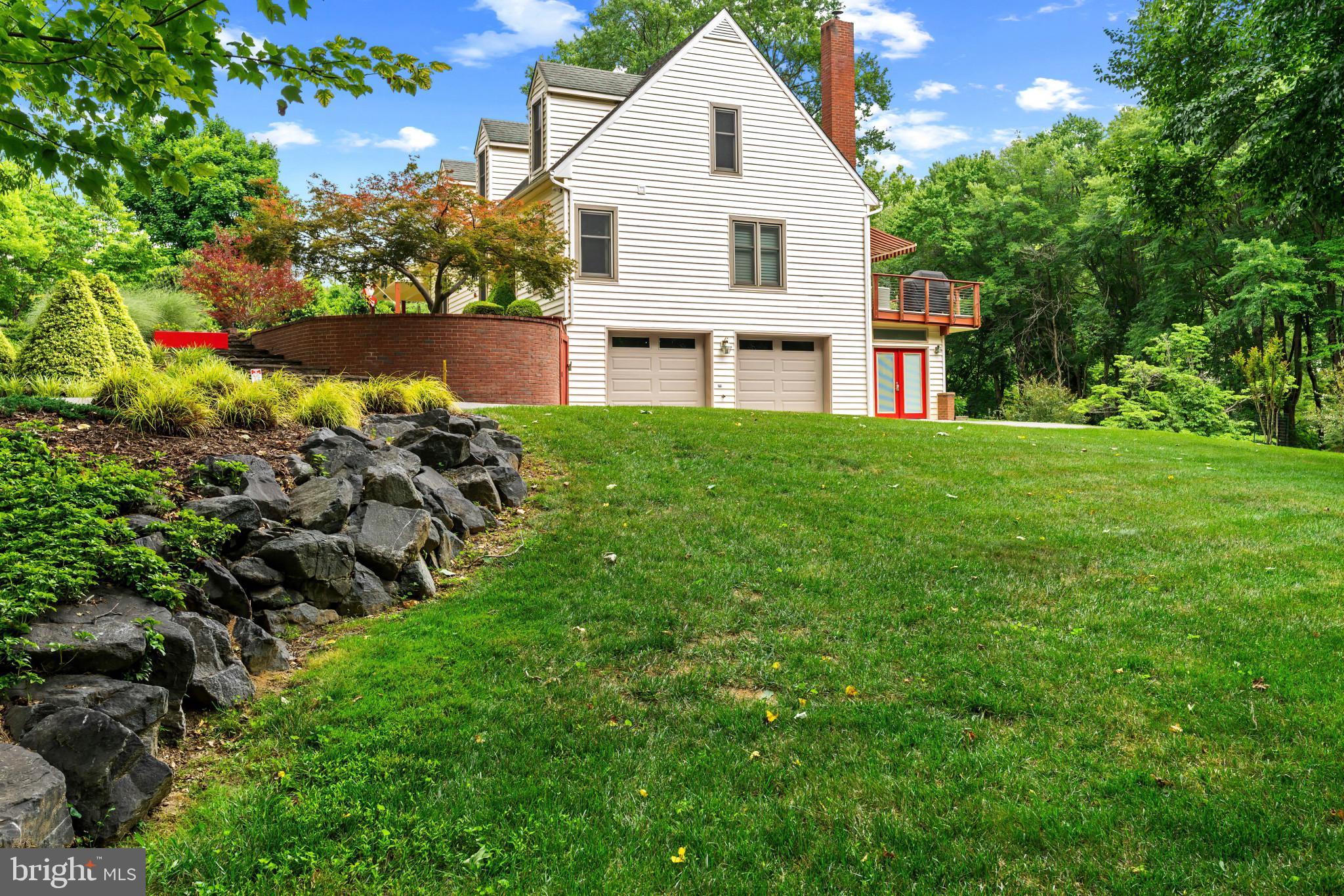 10821 Braeburn Road Columbia, MD 21044 - Photo 8 of 64 a view of a house with a yard