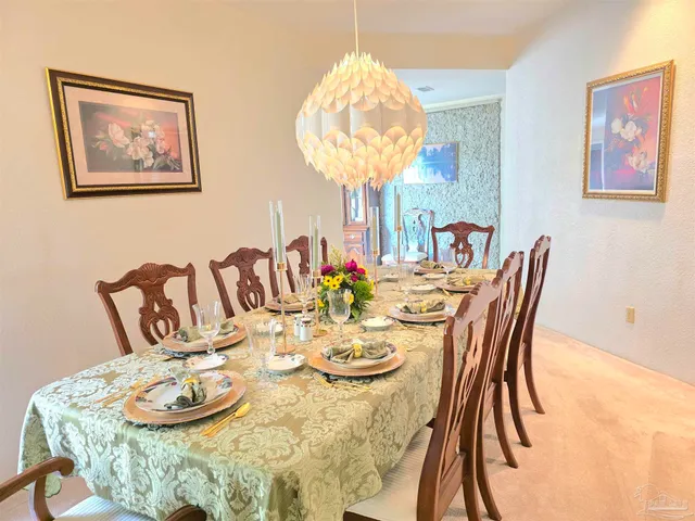 a bedroom with a bed chair and couch