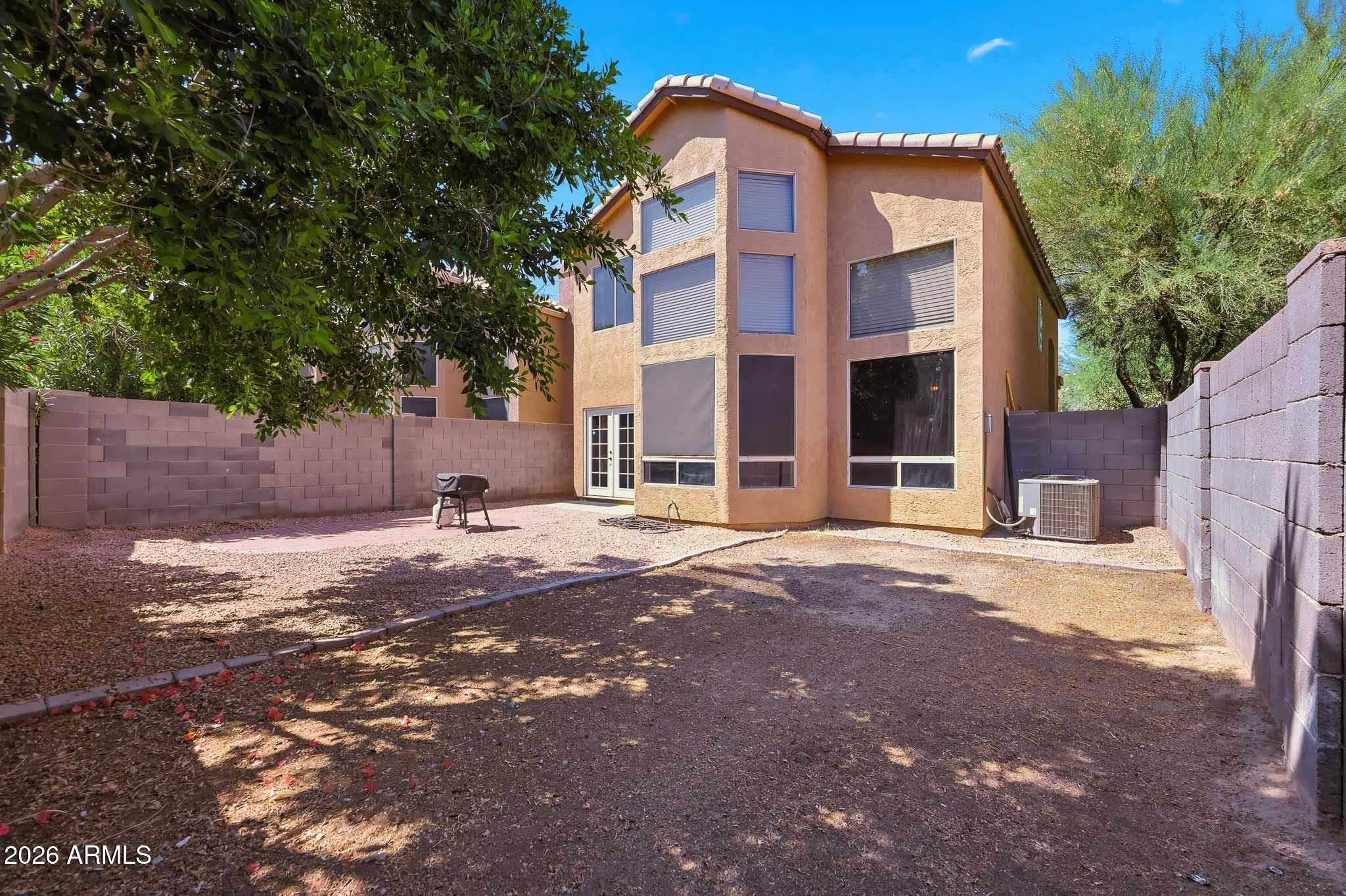 2167 East Nighthawk Way Phoenix, AZ 85048 - Photo 28 of 28 a front view of a house with a yard