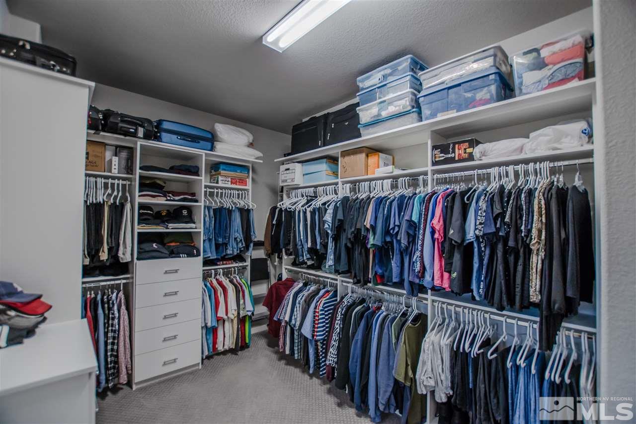 930 Broderick Trail Reno, NV 89523 - Photo 12 of 25 a view of walk in closet with clothes and shoes