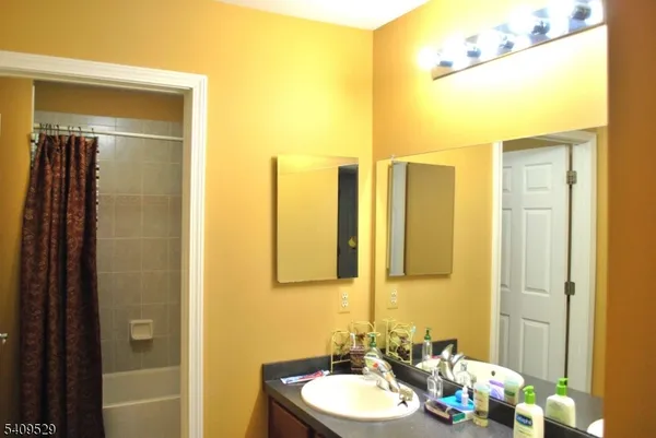 a bed room with furniture and a window