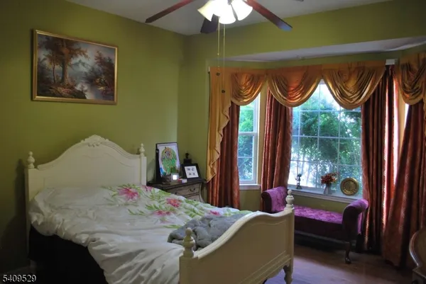 a bathroom with a sink vanity and a mirror