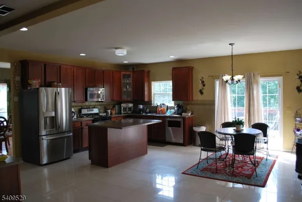 a view of a bath room and a window