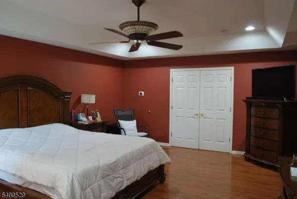 a bathroom with a sink a mirror and a shower