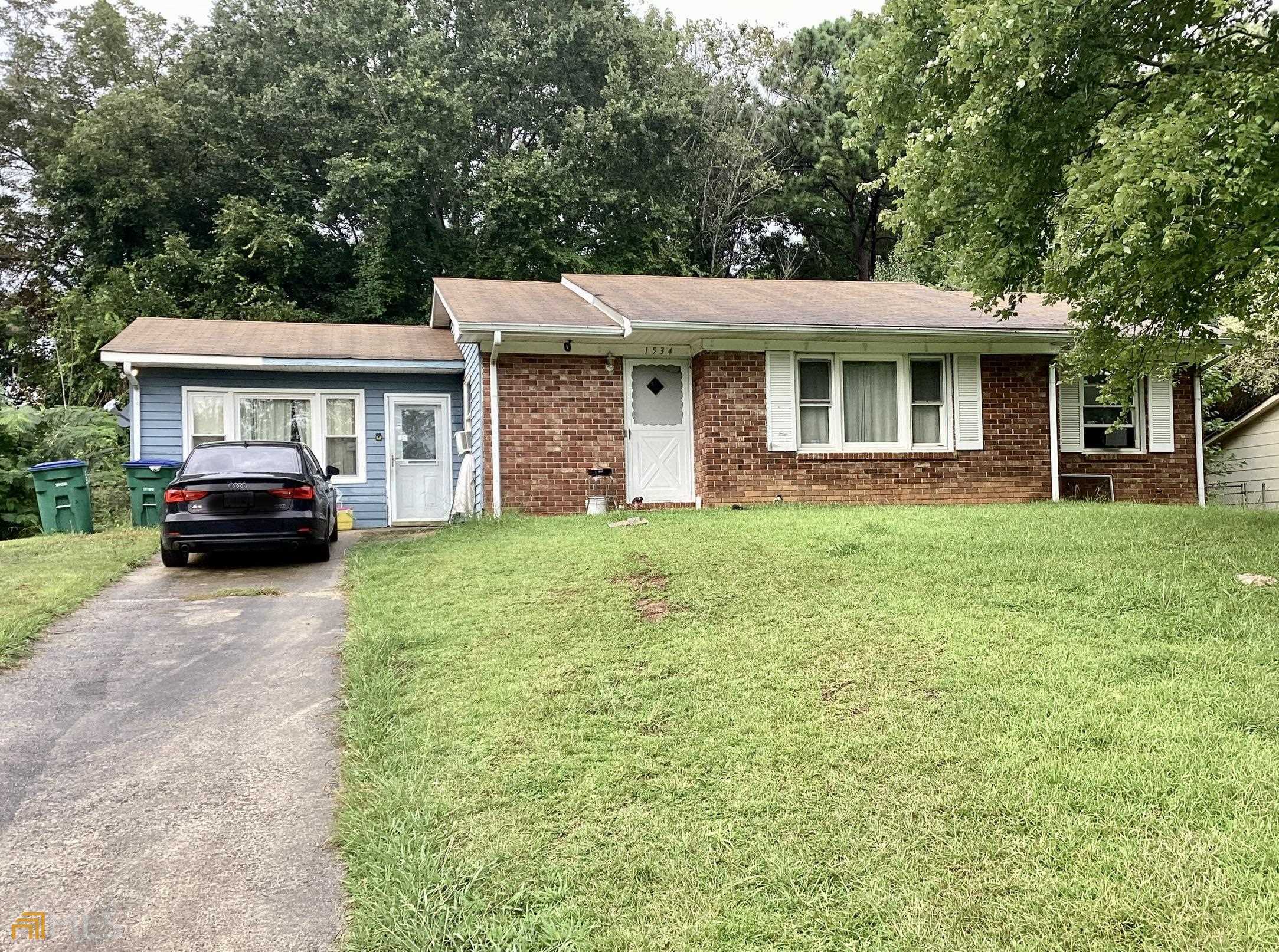 a house view with a garden space