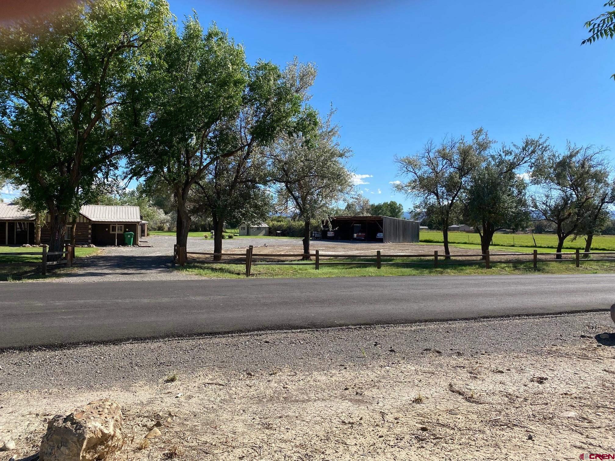 1934 Odelle Road Montrose, CO 81401 - Photo 2 of 10 a view of a house with a yard