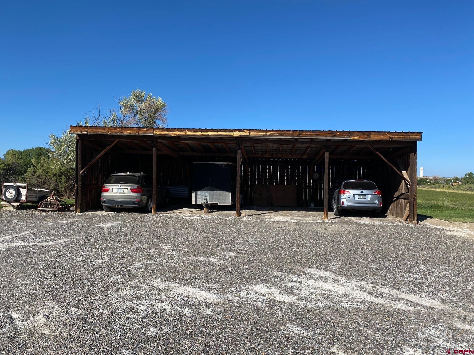 1934 Odelle Road Montrose, CO 81401 - Photo 8 of 10 a car parked in front of a house