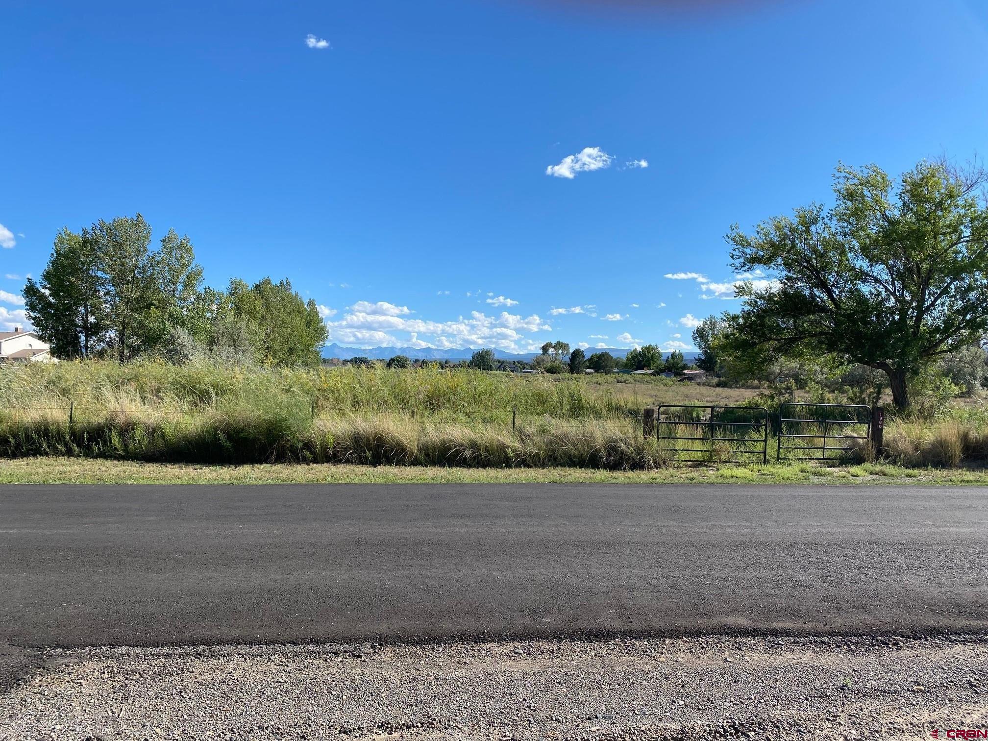 1934 Odelle Road Montrose, CO 81401 - Photo 10 of 10 a view of a road with a building in the background