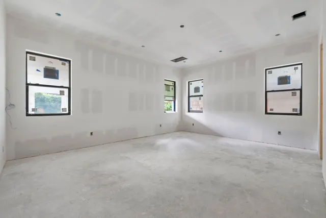 an empty room with windows