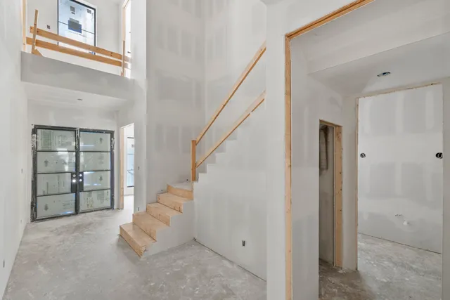 a black and white photo of a living room