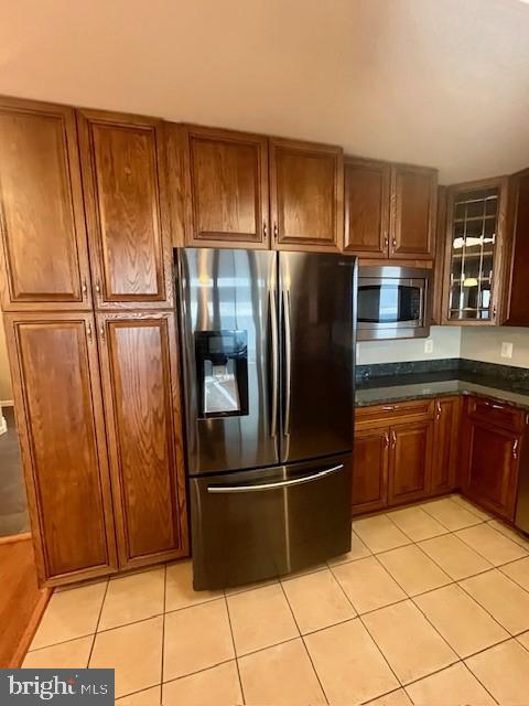 117 Chesapeake Avenue Prince Frederick, MD 20678 - Photo 22 of 65 a kitchen with stainless steel appliances a refrigerator and a sink