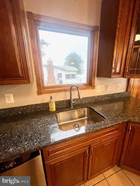 117 Chesapeake Avenue Prince Frederick, MD 20678 - Photo 24 of 65 a kitchen with granite countertop sink and window