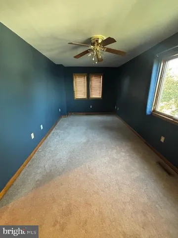 a picture of a room with an empty space