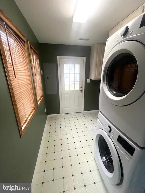 117 Chesapeake Avenue Prince Frederick, MD 20678 - Photo 49 of 65 a bathroom with a sink a washer and dryer