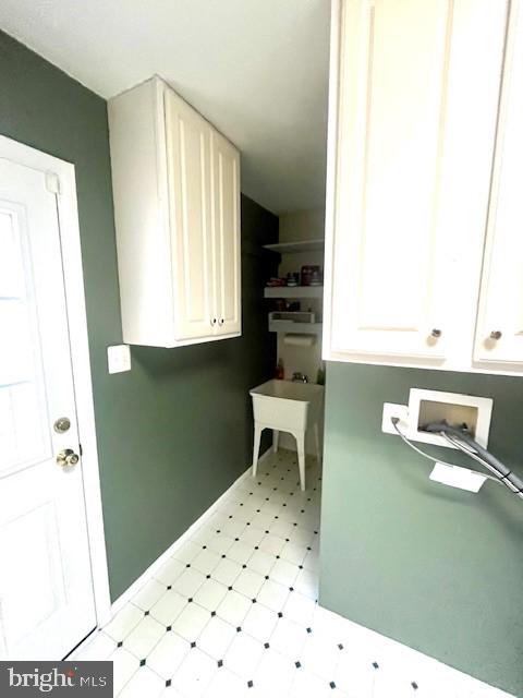 117 Chesapeake Avenue Prince Frederick, MD 20678 - Photo 50 of 65 a bathroom with a sink a toilet and a mirror