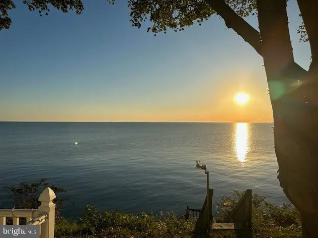 a view of an ocean from sunset