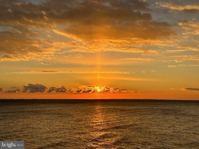 117 Chesapeake Avenue Prince Frederick, MD 20678 - Photo 8 of 65 a view of an ocean from sunset