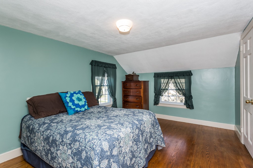 40 Oregon Street Springfield, MA 01118 - Photo 22 of 30 a bedroom with a large bed and a window