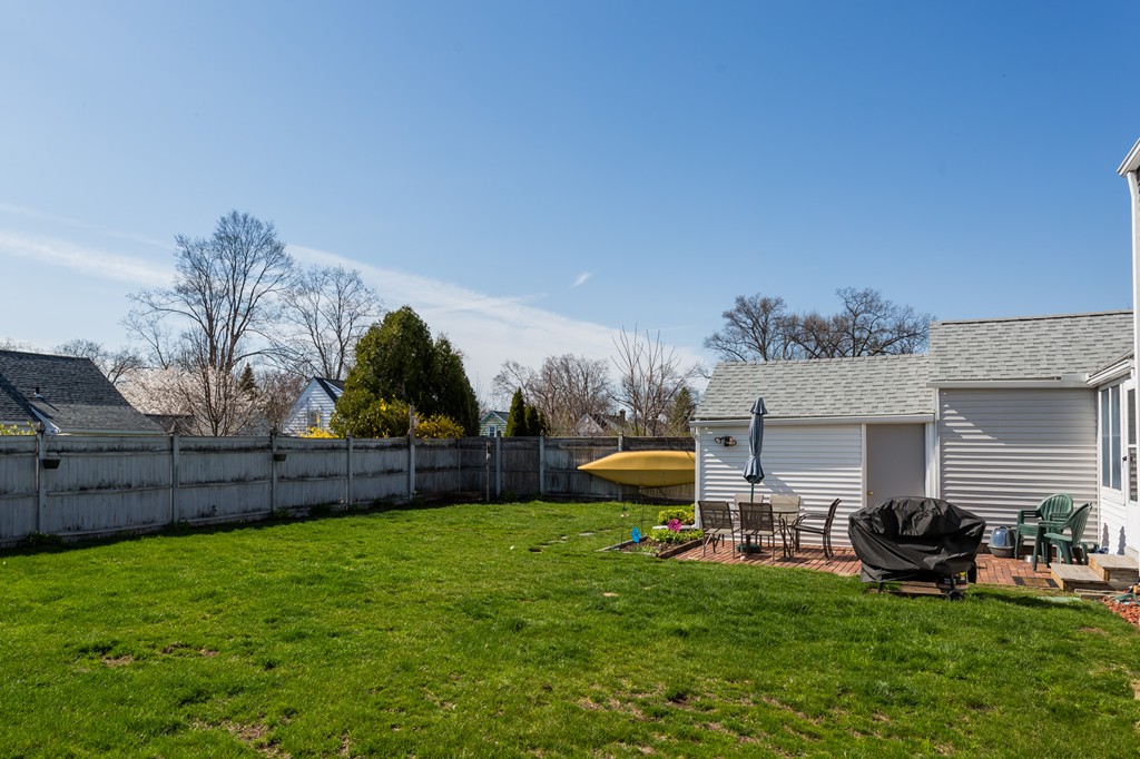 40 Oregon Street Springfield, MA 01118 - Photo 4 of 30 a view of a house with backyard and sitting area